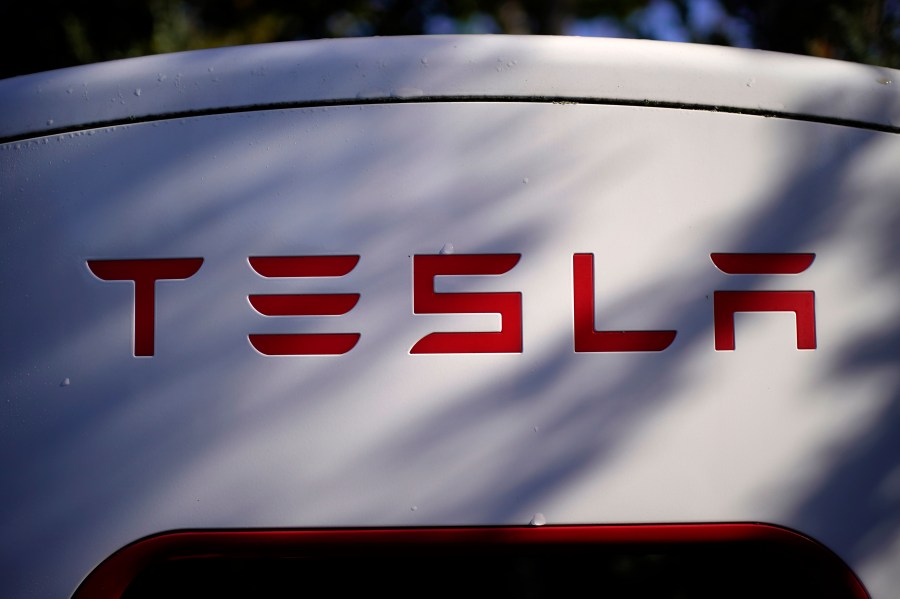 FILE - A Tesla charger is seen, Oct. 19, 2022, in Freeport, Maine. (AP Photo/Robert F. Bukaty, File)