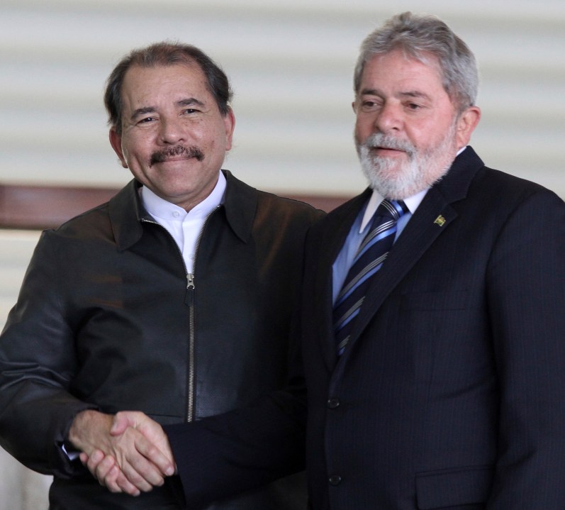 FILE - Nicaragua's President Daniel Ortega, left, shakes hands with Brazil's President Luiz Inacio Lula da Silva at Itamaraty palace in Brasilia, Brazil July 28, 2010. (AP Photo/Eraldo Peres, File)