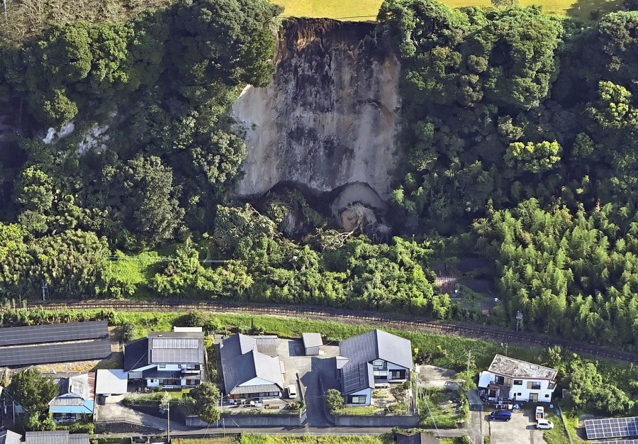 This aerial photo shows the site of a landslide in Shibushi, Kagoshima prefecture, southern Japan Friday, Aug. 9, 2024, following Thursday's powerful earthquake. (Kyodo News via AP)