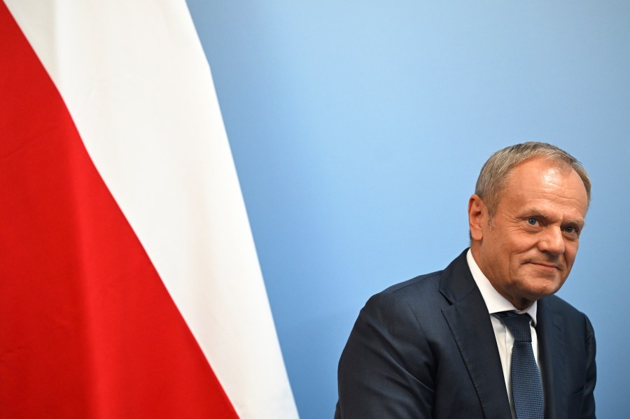 Poland's Prime Minister Donald Tusk reacts during a bilateral meeting with Britain's Prime Minister Keir Starmer, at the European Political Community meeting, at Blenheim Palace in Woodstock, southern England, Thursday July 18, 2024. (Justin Tallis/Pool Photo via AP)