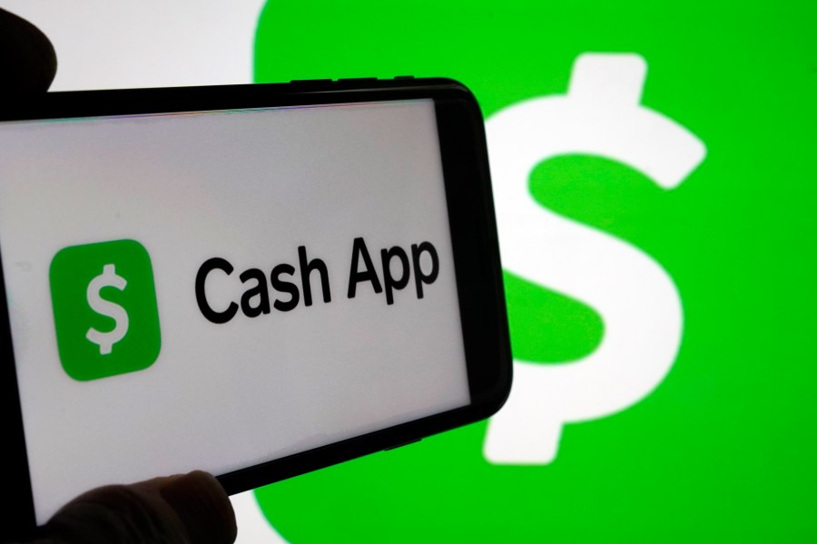 FILE - Cash App logos are seen on a phone screen, Sept. 8, 2023, in New York. (AP Photo/Richard Drew, File)