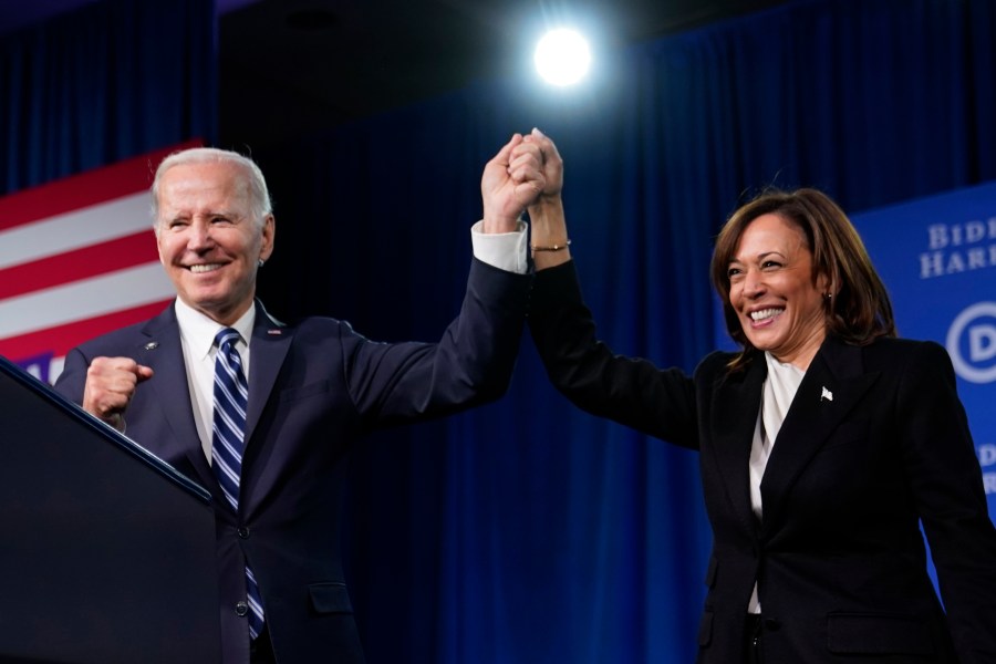 FILE - President Joe Biden and Vice President Kamala Harris stand on stage at the Democratic National Committee winter meeting, Feb. 3, 2023, in Philadelphia. (AP Photo/Patrick Semansky, File)