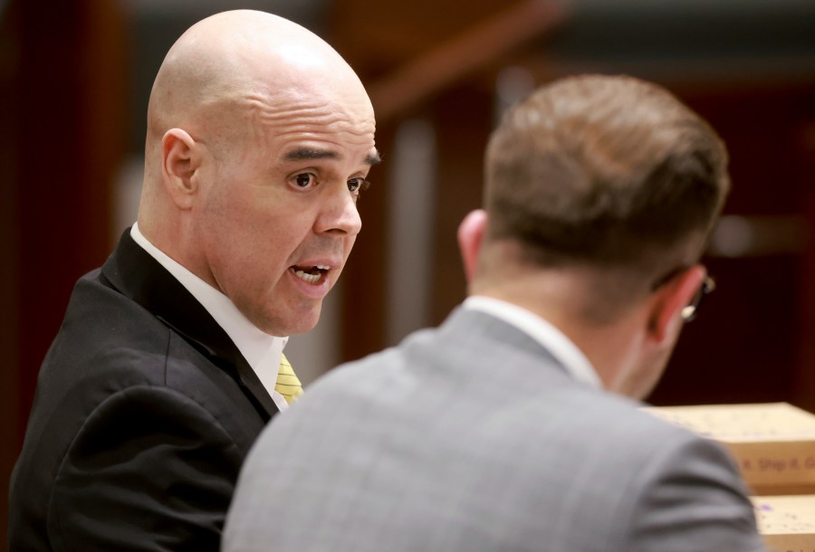 Robert Telles, left, speaks with attorney Michael Horvath on the first day of jury selection for his trial in the murder of Las Vegas Review-Journal investigative journalist Jeff German, at the Regional Justice Center in Las Vegas, Monday, Aug. 12, 2024. (K.M. Cannon/Las Vegas Review-Journal via AP, Pool)