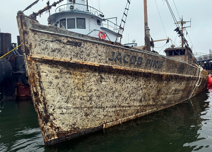 In this image provided by Aaron Pike Rugh, the retired sardine carrier Jacob Pike, which sank last winter off Harpswell, Maine, is seen after a salvage company raised the vessel in this photo taken, Saturday, Aug. 10, 2024, in waters off South Portland, Maine. (AP Photo/Aaron Pike Rugh)