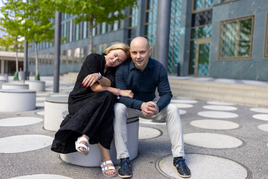 Andrei Pivovarov, a Russian dissident freed in the Aug. 1 East-West prisoner swap, right, and his wife, Tatyana Usmanova, pose for a photo before an interview with The Associated Press in Berlin, Germany, on Sunday, Aug. 12, 2024. (AP Photo/Axel Schmidt)