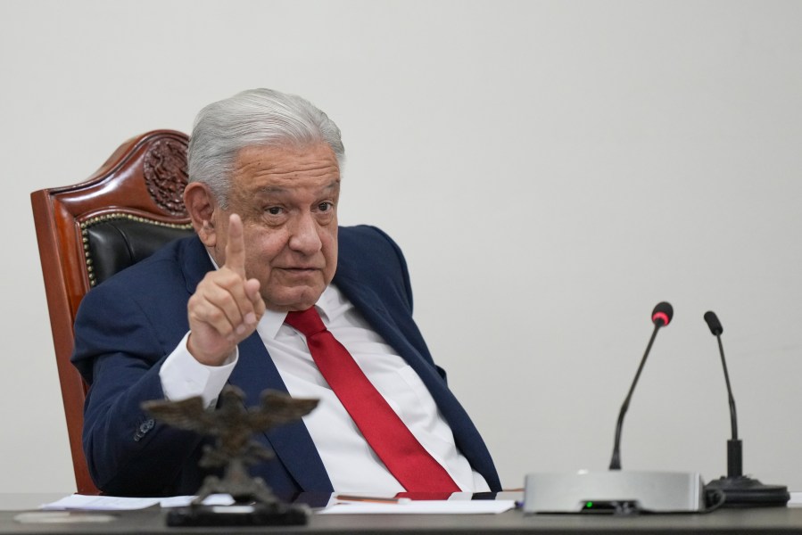 Mexican President Andres Manuel Lopez Obrador meets with his security cabinet at the National Place in Mexico City, Friday, Aug. 2, 2024. (AP Photo/Fernando Llano)