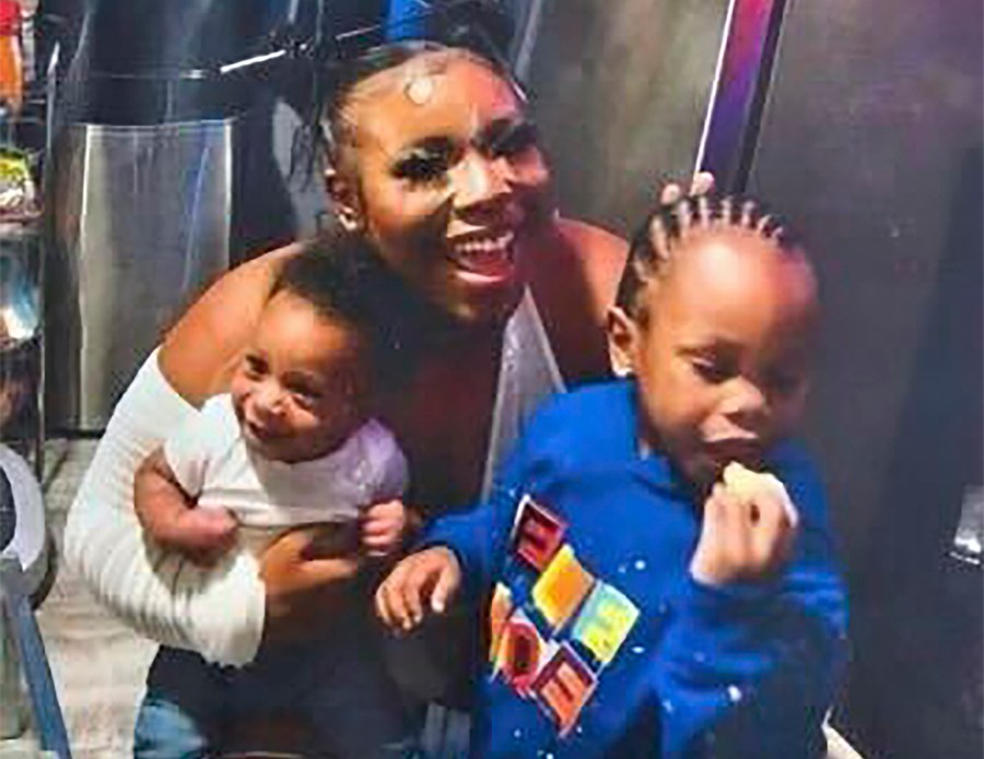 In this undated photo released by the Young Family via their family attorney, Ta'Kiya Young is pictured with her sons, Ja'Kobie, right, and Ja'Kenlie, left. (Courtesy of Young Family/Walton + Brown LLP via AP)