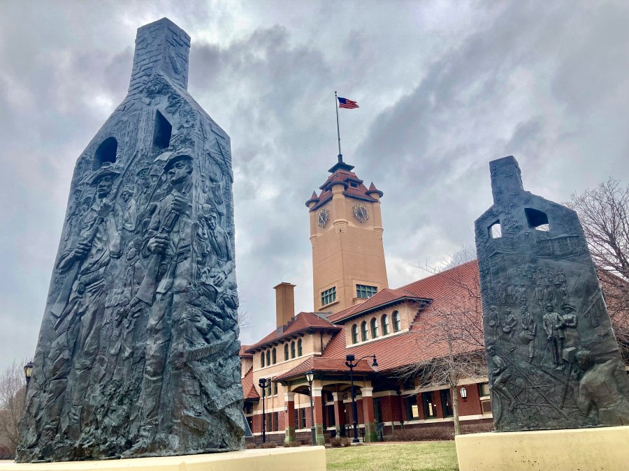 FILE - Sculptures representing charred chimneys rising from the smoldering rubble of burned-out buildings make up the Centennial memorial of the 1908 Race Riot entitled, "Acts of Intolerance" by Preston Jackson, on Wednesday March 22, 2023, in Springfield, Ill. (AP Photo/John O'Connor, File)