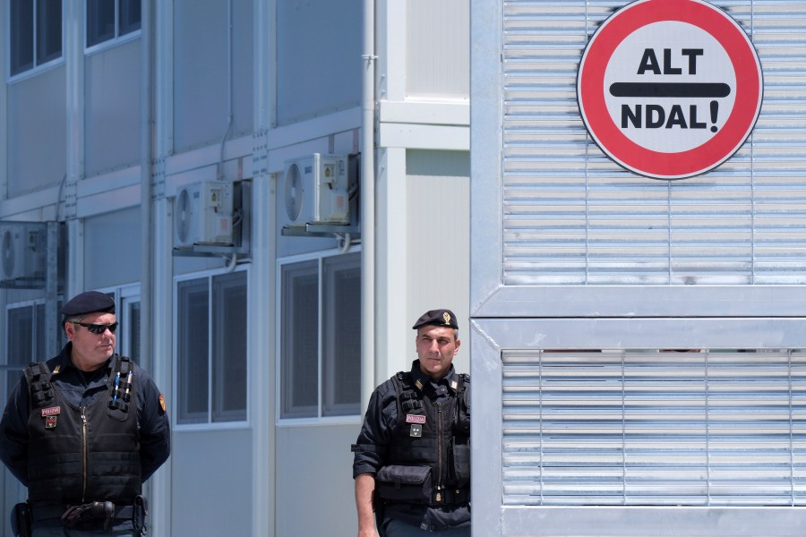 FILE- Police guard a reception center for migrants, at the port of Shenjin, northwestern Albania, on Wednesday, June 5, 2024. (AP Photo/Vlasov Sulaj, File)