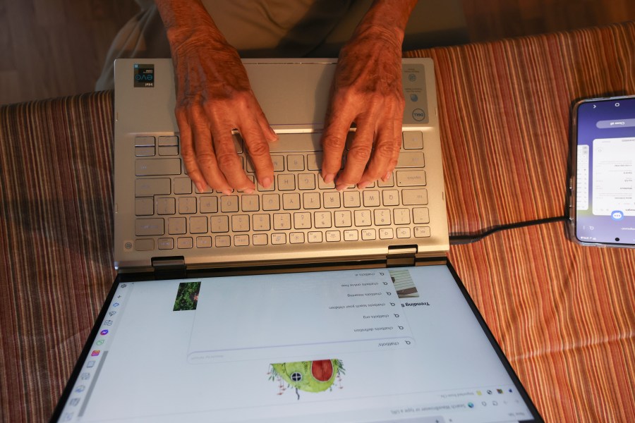 Barbara Winston uses a computer at her home in Northbrook, Ill., on Sunday, June 30, 2024, several days after taking an introduction to artificial intelligence class at a local senior center. (AP Photo/Teresa Crawford)