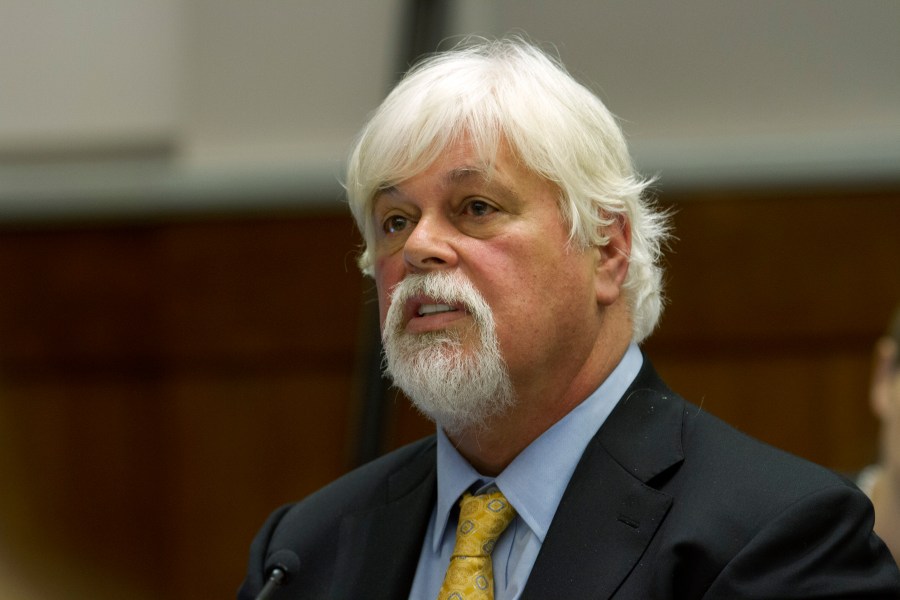 FILE - Anti-whaling activist Paul Watson, founder of the Oregon-based Sea Shepherd Conservation Society, testifies during a contempt of court hearing in federal court, Nov. 6, 2013, in Seattle. (AP Photo/Karen Ducey, Pool, File)