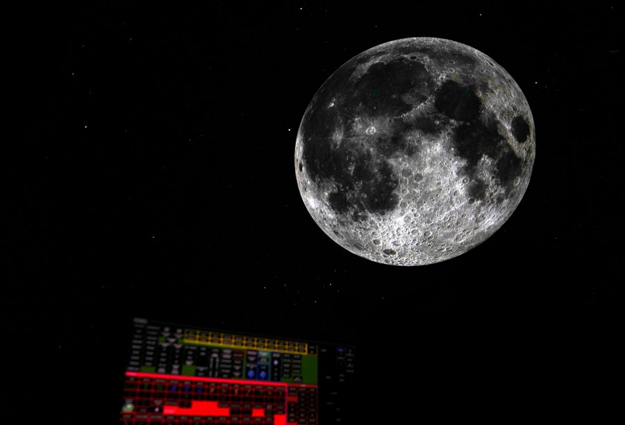 An image of the moon is projected at the Iziko Planetarium in Cape Town, South Africa, Tuesday, Aug. 13, 2024 as part of the World Astronomy Conference. (AP Photo/Nardus Engelbrecht)