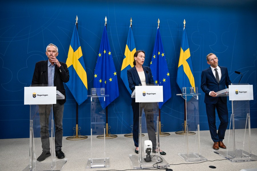 State epidemiologist Magnus Gisslén, from left, Olivia Wigzell, acting director general of the Public Health Agency and Social minister Jakob Forssmed give a press conference to inform about the situation regarding mpox, in Stockholm, Sweden, Thursday Aug. 15, 2024. (Fredrik Sandberg/TT News Agency via AP)