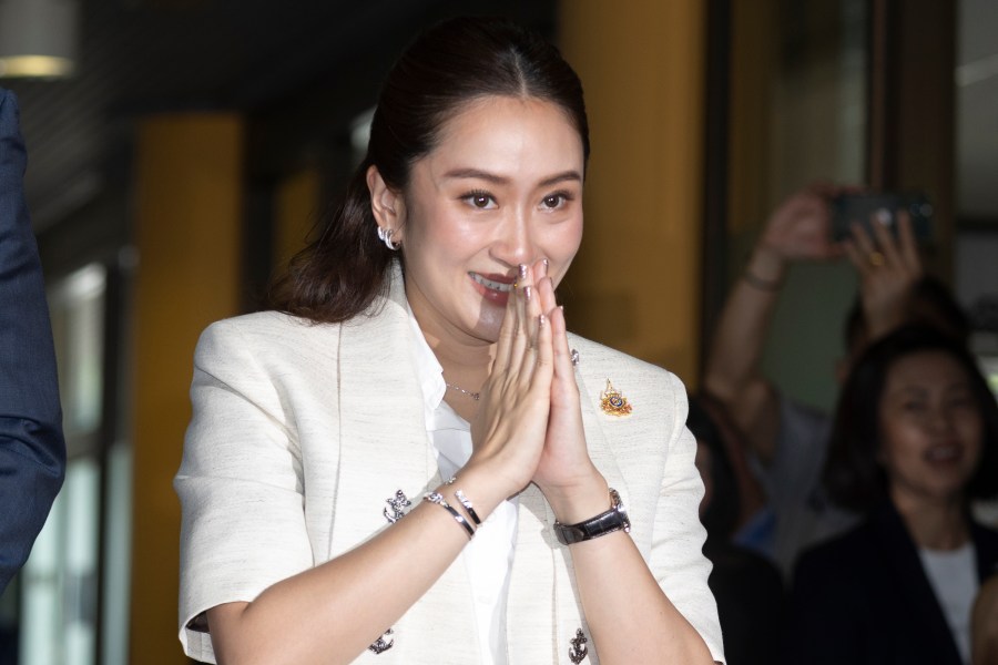 Leader of the Pheu Thai party, Paetongtarn Shinawatra arrives at the party's headquarters in Bangkok, Thailand, Friday, Aug. 16, 2024. (AP Photo/Wason Wanichakorn)