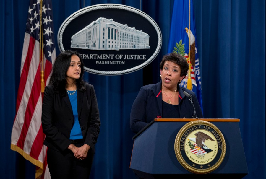 FILE - Attorney General Loretta Lynch, joined by Principal Deputy Assistant Attorney General Vanita Gupta speaks during a news conference at the Justice Department in Washington, Wednesday, Feb. 10, 2016, about Ferguson, Mo. (AP Photo/Carolyn Kaster, File)