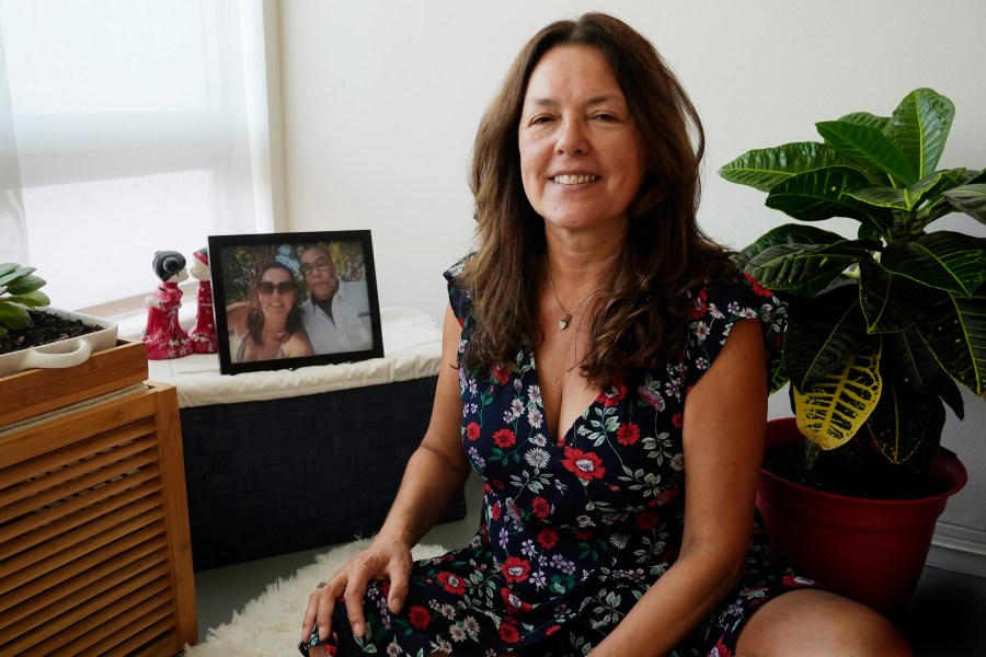 Maria Zambrano sits at her apartment, Monday, Aug. 12, 2024, in Bal Harbour, Fla. (AP Photo/Marta Lavandier)