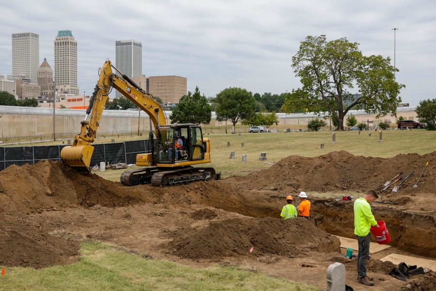 FILE - Researchers work in Oaklawn Cemetery as they search for victims of the 1921 Tulsa Race Massacre, Sept. 11, 2023 in Tulsa, Okla. (Mike Simons /Tulsa World via AP, File)