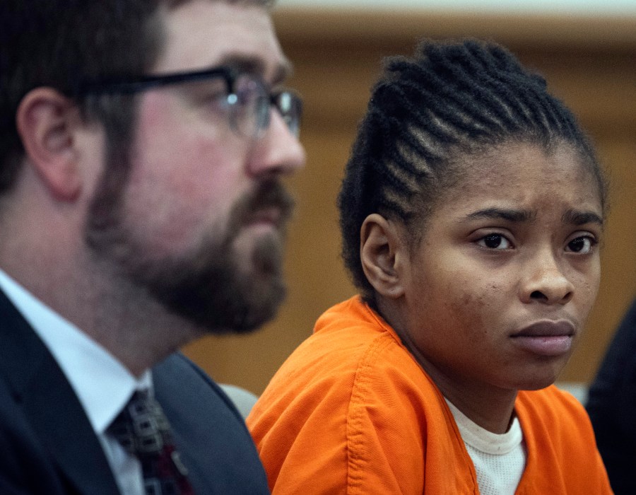 FILE - Chrystul Kizer,, listens as she sits with her attorney Gregory Holdahl during a hearing Thursday, May 9, 2024, at the Kenosha County Courthouse in Kenosha, Wis. (Sean Krajacic/The Kenosha News via AP, file)