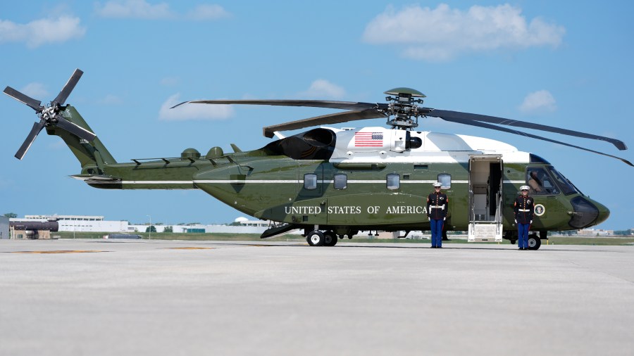 A new Marine One awaits President Joe Biden at Chicago O'Hare International Airport in Chicago, Monday, August 19, 2024. Biden on Monday took his first flight aboard the modern VH-92A helicopter that serves as Marine One after years of delays to the program to replace the aging aircraft that carry the president and vice president. Biden boarded the Sikorsky-made helicopter after arriving on Air Force One in Chicago where he is speaking Monday evening at the Democratic National Convention. (AP Photo/Stephanie Scarbrough)