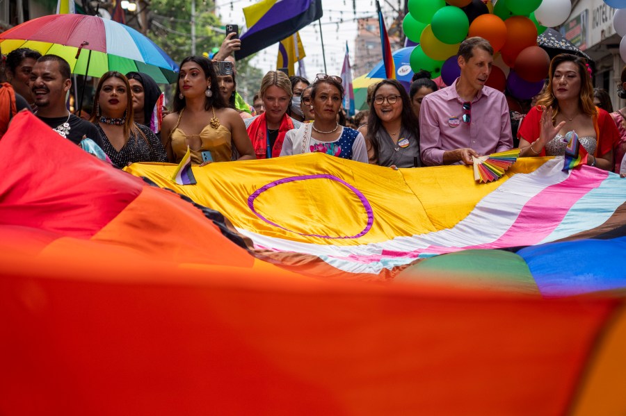 LGBTQ+ people and their supporters rally during the annual pride parade, in Kathmandu, Nepal, Tuesday, Aug. 20, 2024. (AP Photo/Niranjan Shrestha)