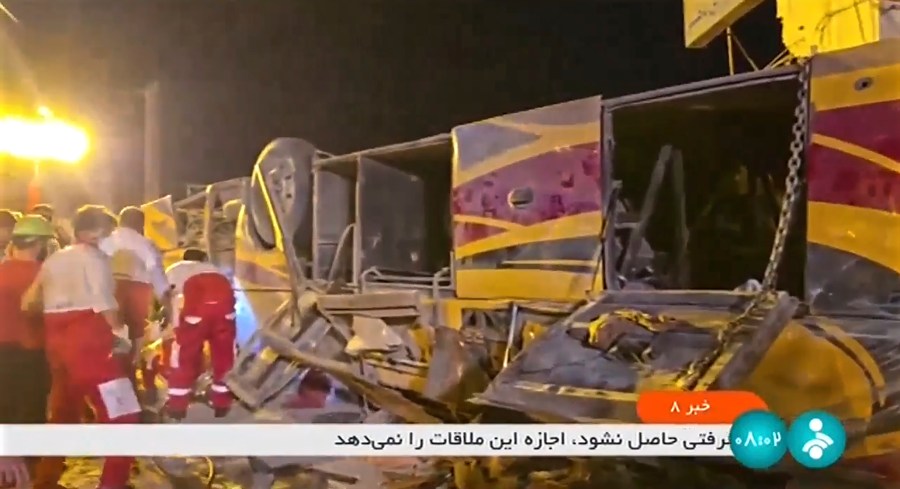 This image taken from a video released by Iranian state television shows the aftermath of a bus crash near Taft, Iran, early Wednesday, Aug. 21, 2024. A bus carrying Shiite pilgrims from Pakistan to Iraq crashed in central Iran, killing multiple people, an official said Wednesday. (Iranian state television via AP)