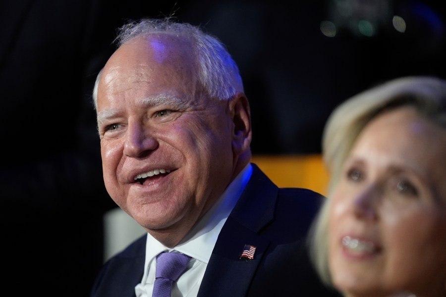 Democratic vice presidential nominee Minnesota Gov. Tim Walz and his wife Gwen Walz watch during the Democratic National Convention Monday, Aug. 19, 2024, in Chicago. (AP Photo/Erin Hooley)