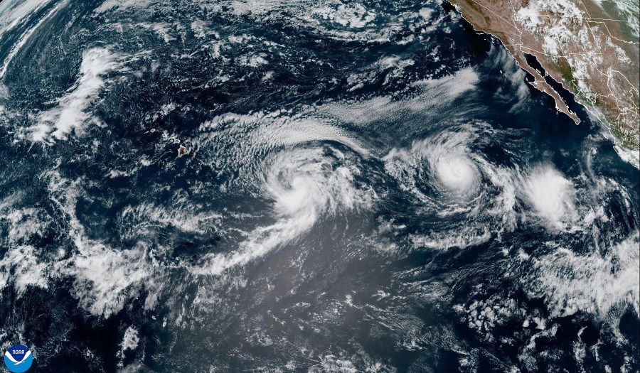 This satellite image provided by the National Oceanic and Atmospheric Administration (NOAA) shows Hurricane Gilma and Tropical Storm Hone, located west-southwest of the southern tip of the Baja California peninsula of Mexico, Thursday, Aug. 22, 2024. (NOAA via AP)