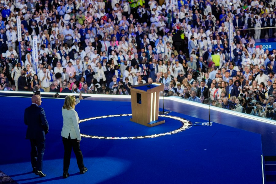 Sen. Mark Kelly, D-Az., and former Rep. Gabrielle Giffords speak during the Democratic National Convention Thursday, Aug. 22, 2024, in Chicago. (AP Photo/Matt Rourke)