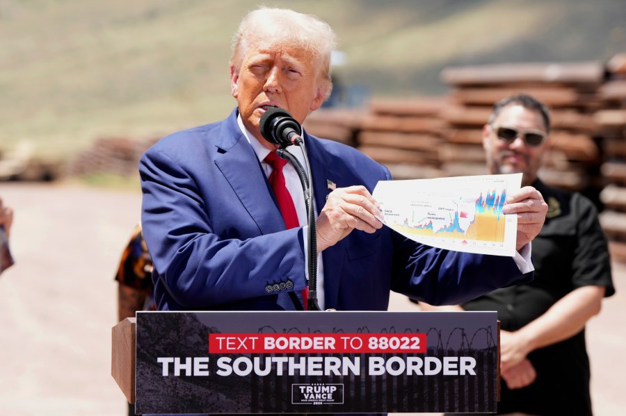 Former President Donald Trump speaks during a campaign event in front of the US-Mexico border, Thursday, Aug 22, 2024, in Sierra Vista, Arizona. (AP Photo/Rick Scuteri)