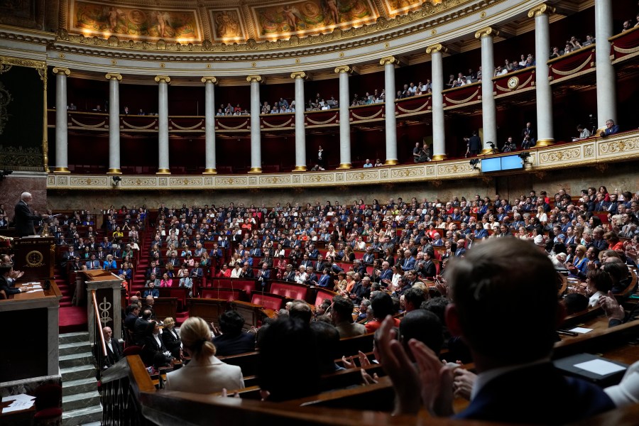 FILE - Parliament members convene during the vote for the lower house president in the National Assembly, July 18, 2024 in Paris. (AP Photo/Michel Euler, File)