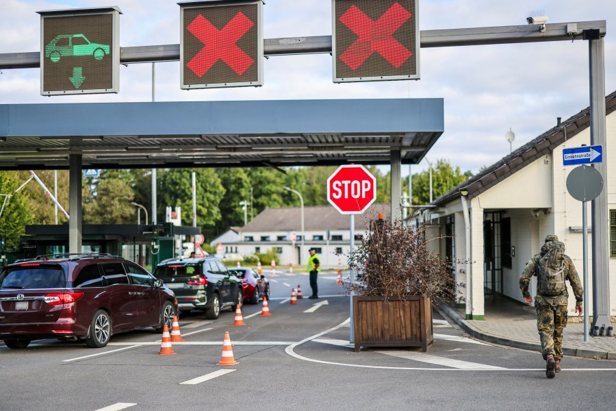 Soldiers check the entrance to the NATO air base, in Geilenkirchen, Germany, Friday, Aug. 23, 2024. (Christoph Reichwein/dpa via AP)