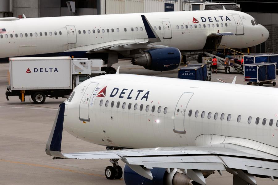 FILE - A Delta Air Lines plane leaves the gate, July 12, 2021, at Logan International Airport in Boston. (AP Photo/Michael Dwyer, File)