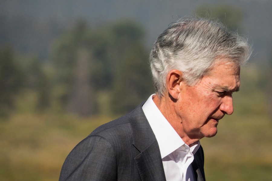 Federal Reserve Chairman Jerome Powell walks outside of the Jackson Hole Economic Symposium at Jackson Lake Lodge in Grand Teton National Park near Moran, Wyo., on Friday, Aug. 23, 2024. (AP Photo Amber Baesler)