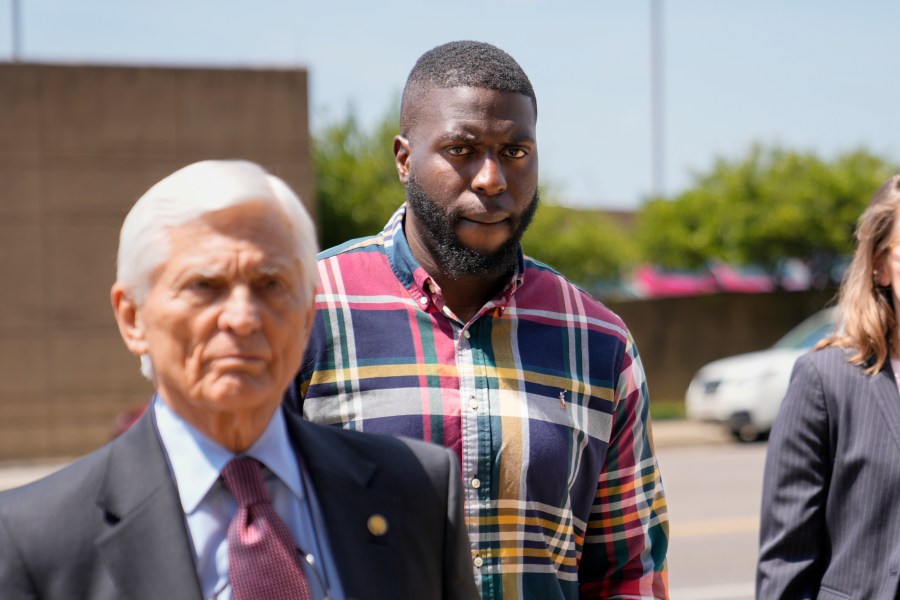 Emmitt Martin III, a former Memphis Police Department officer, second from left, accused of killing Tyre Nichols, walks into federal court Friday, Aug. 23, 2024, in Memphis, Tenn. (AP Photo/George Walker IV)