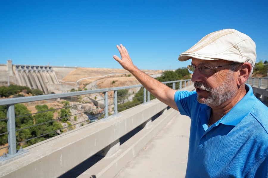 George Booth talks about the Folsom Dam, Friday, Aug. 16, 2024, in Folsom, Calif. (AP Photo/Godofredo A. Vásquez)