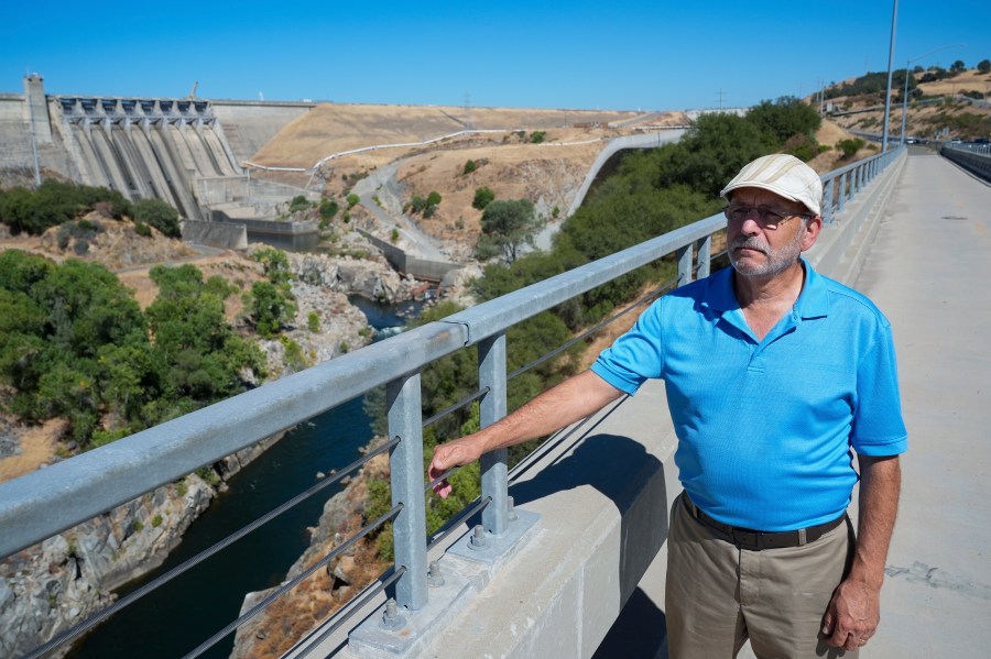 George Booth, executive director of the Floodplain Management Association, is photographed in front of Folsom Dam, Friday, Aug. 16, 2024, in Folsom, Calif. (AP Photo/Godofredo A. Vásquez)