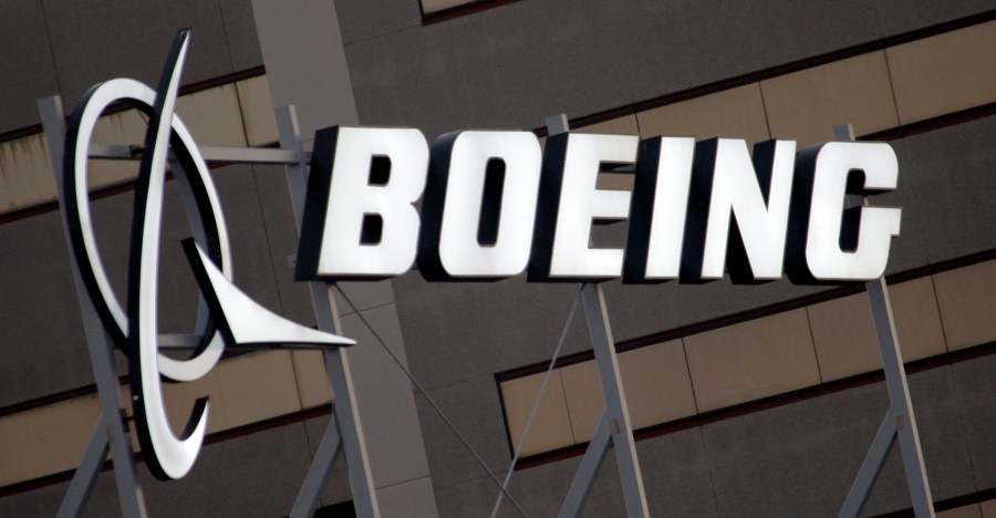 FILE - The Boeing logo is displayed in El Segundo, Calif., on Jan. 25, 2011. (AP Photo/Reed Saxon, File)