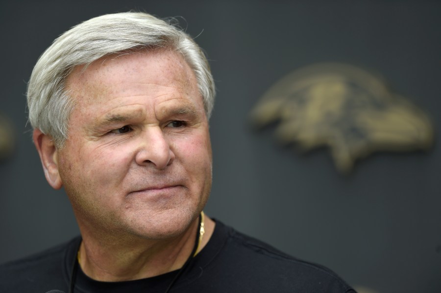 FILE - Baltimore Ravens offensive line coach Joe D'Alessandris after an NFL football training camp practice, Aug. 3, 2021, in Owings Mills, Md. (AP Photo/Gail Burton, File)