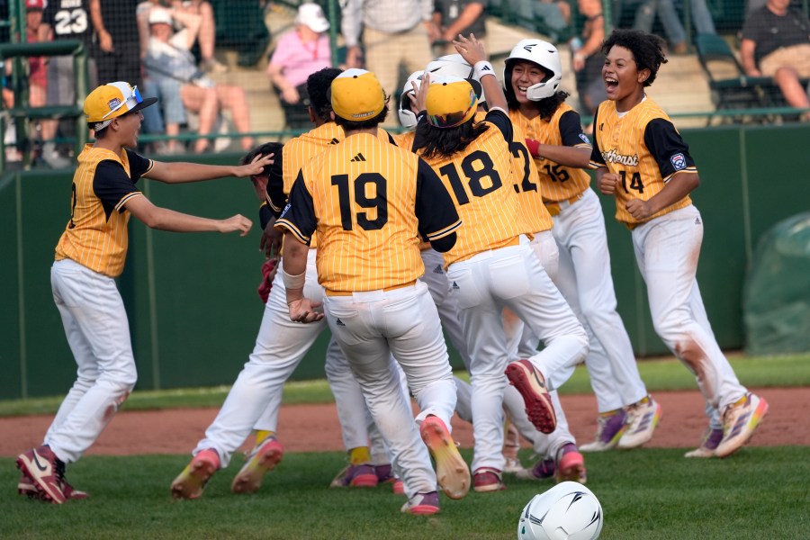 Lake Mary, Fla. celebrates their 2-1 against Taiwan during the Little League World Series Championship game in South Williamsport, Pa., Sunday, Aug. 25, 2024. (AP Photo/Tom E. Puskar)