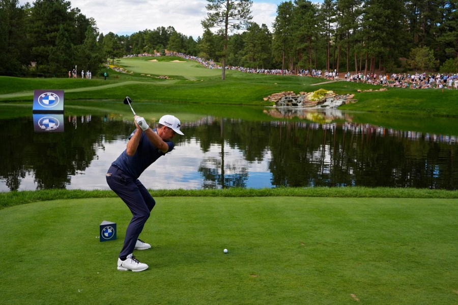 Keegan Bradley hits from the 17th tee during the final round of the BMW Championship golf event at Castle Pines Golf Club, Sunday, Aug. 25, 2024, in Castle Rock, Colo. (AP Photo/Matt York)