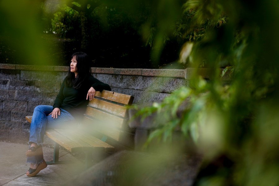 Ellen Lo Hoffman, the co-founder of Soul Reparations, a nonprofit providing free spiritual support to women, poses for a portrait near her home Wednesday, Aug. 21, 2024, in Bothell, Wash. (AP Photo/Lindsey Wasson)