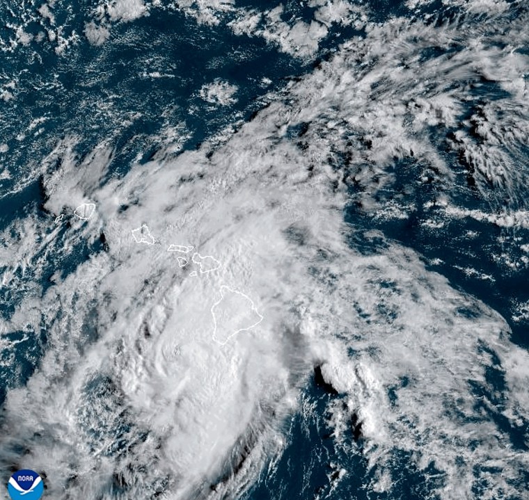 This Aug. 25, 2024 satellite image provided by the National Oceanic and Atmospheric Administration shows Hurricane Hone passing south of Hawaii. (NOAA via AP)