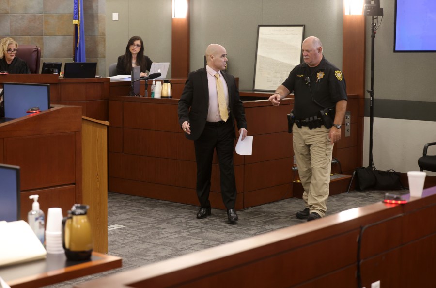 Robert Telles is directed off the witness stand after testifying during his murder trial at the Regional Justice Center in Las Vegas, Friday, Aug. 23, 2024. Telles, a former Clark County public administrator, is charged in the murder of Las Vegas Review-Journal investigative journalist Jeff German. (K.M. Cannon/Las Vegas Review-Journal via AP)