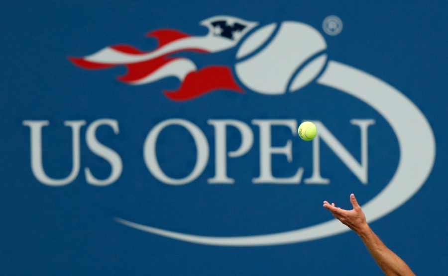 FILE - Philipp Kohlschreiber, of Germany, serves to John Millman, of Australia, during the third round of the U.S. Open tennis tournament in New York, Sept. 2, 2017. The 2024 U.S. Open begins Monday, Aug. 26.(AP Photo/Adam Hunger, File)