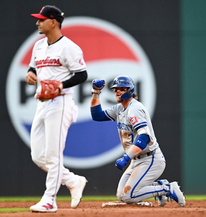 Kansas City Royals' Bobby Witt Jr. (7) celebrates hitting a double during the third inning of the second game of a baseball doubleheader against the Cleveland Guardians, Monday, Aug. 26, 2024, in Cleveland. (AP Photo/Nick Cammett)