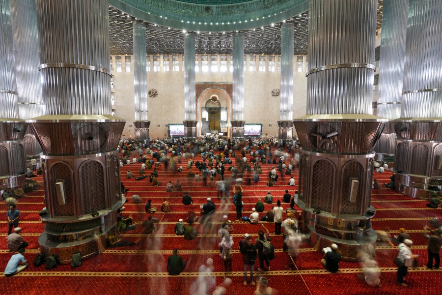 Muslim men leave after Friday prayers at Istiqlal Mosque in Jakarta, Indonesia, Friday, Aug. 9, 2024. (AP Photo/Tatan Syuflana)