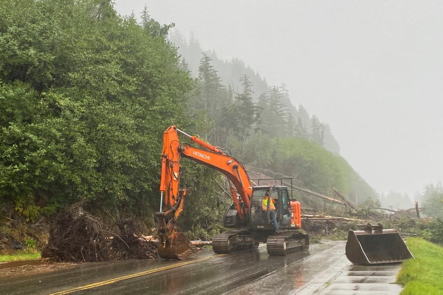 A worker clears debris after a deadly landslide in Ketchikan, Alaska, Sunday, Aug. 25, 2024. (Anna Laffrey/Ketchikan Daily News via AP)