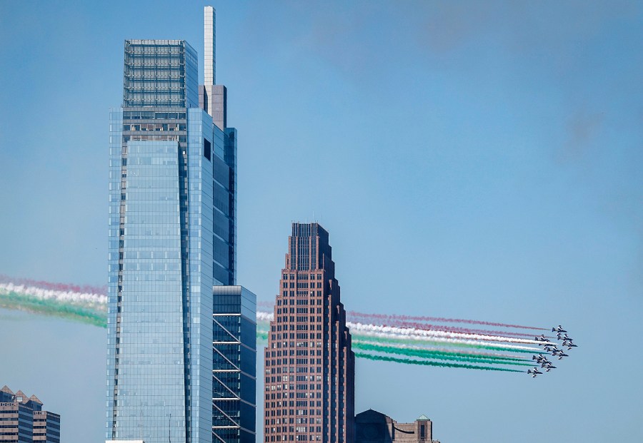 The Italian Air Force Frecce Tricolori flies over Center City Philadelphia on Monday, Aug. 12, 2024. (Yong Kim/The Philadelphia Inquirer via AP)