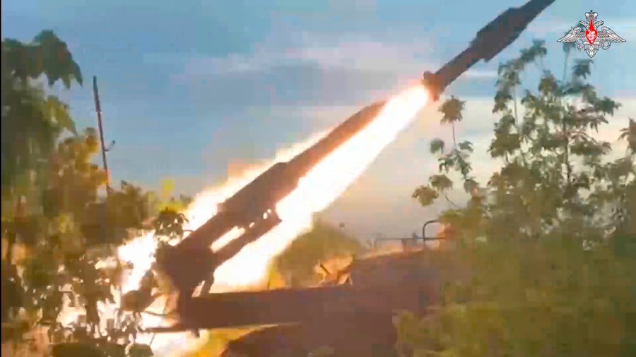 In this photo taken from video released by the Russian Defense Ministry on Sunday, Aug. 25, 2024, a Russian Army Buk-2M self-propelled, medium-range surface-to-air missile system fires at air targets in an undisclosed location in Ukraine. (Russian Defense Ministry Press Service via AP)