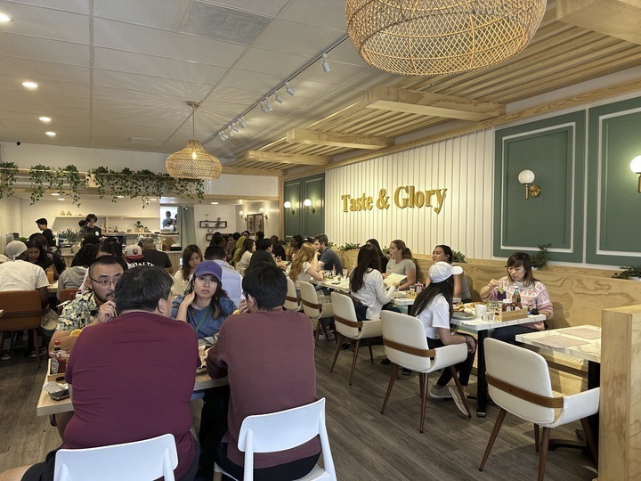 Customers eat weekend brunch items at Taste & Glory restaurant in San Mateo, Calif., on Saturday, Aug. 17, 2024. While "Asian brunch" may initially evoke images of traditional meals like Chinese dim sum, it's become shorthand for restaurants offering Asian takes on American brunch. (AP Photo/Terry Tang)